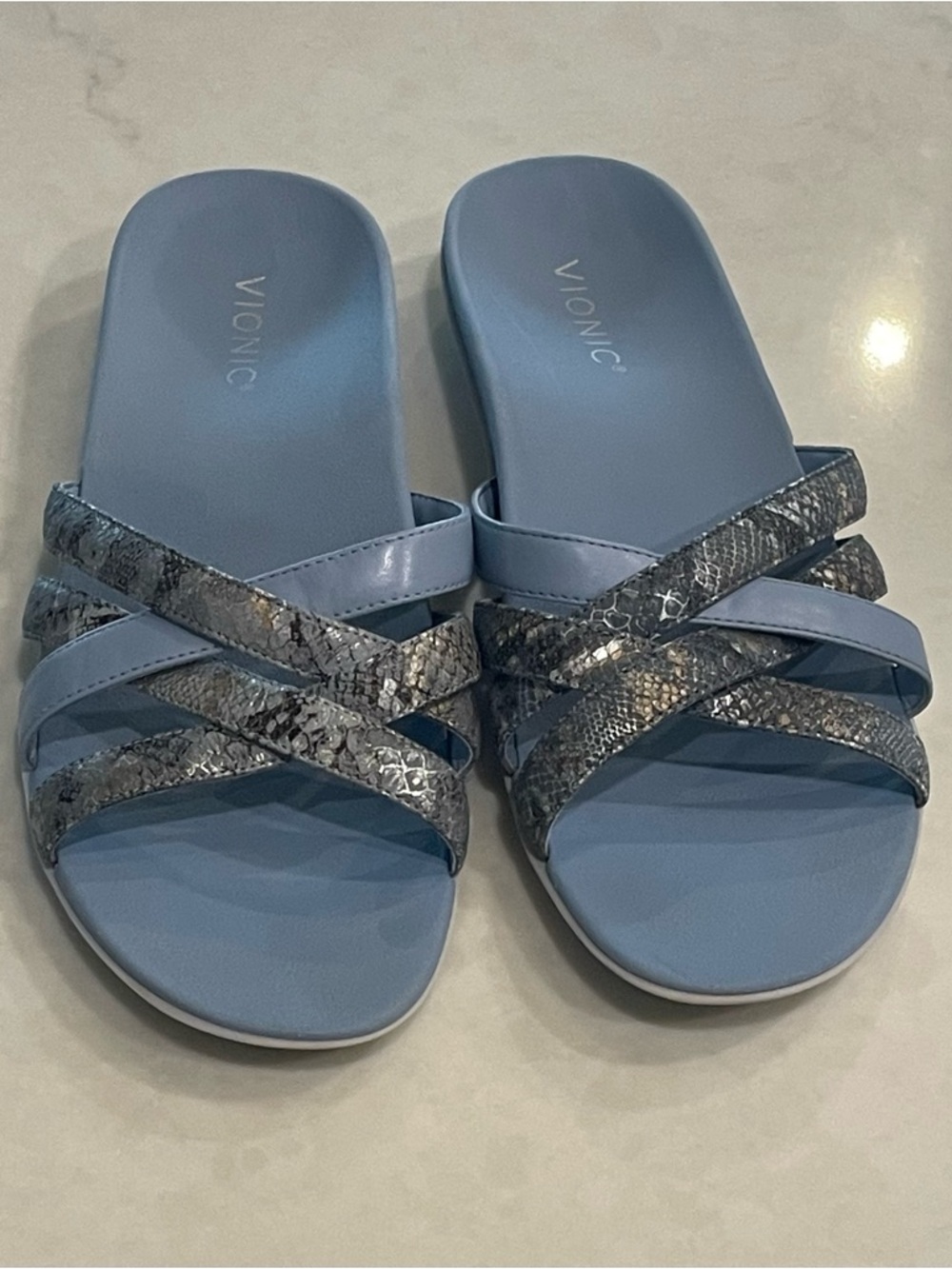Vionic Dava Boa light blue snakeskin cross strap side sandal